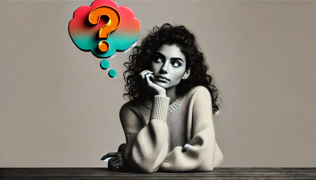 Junge Frau mit lockigem Haar und Pullover sitzt nachdenklich am Tisch, mit einer Denkblase und einem farbigen Fragezeichen über ihrem Kopf. Vision und Mission auf gutes-wissen.org